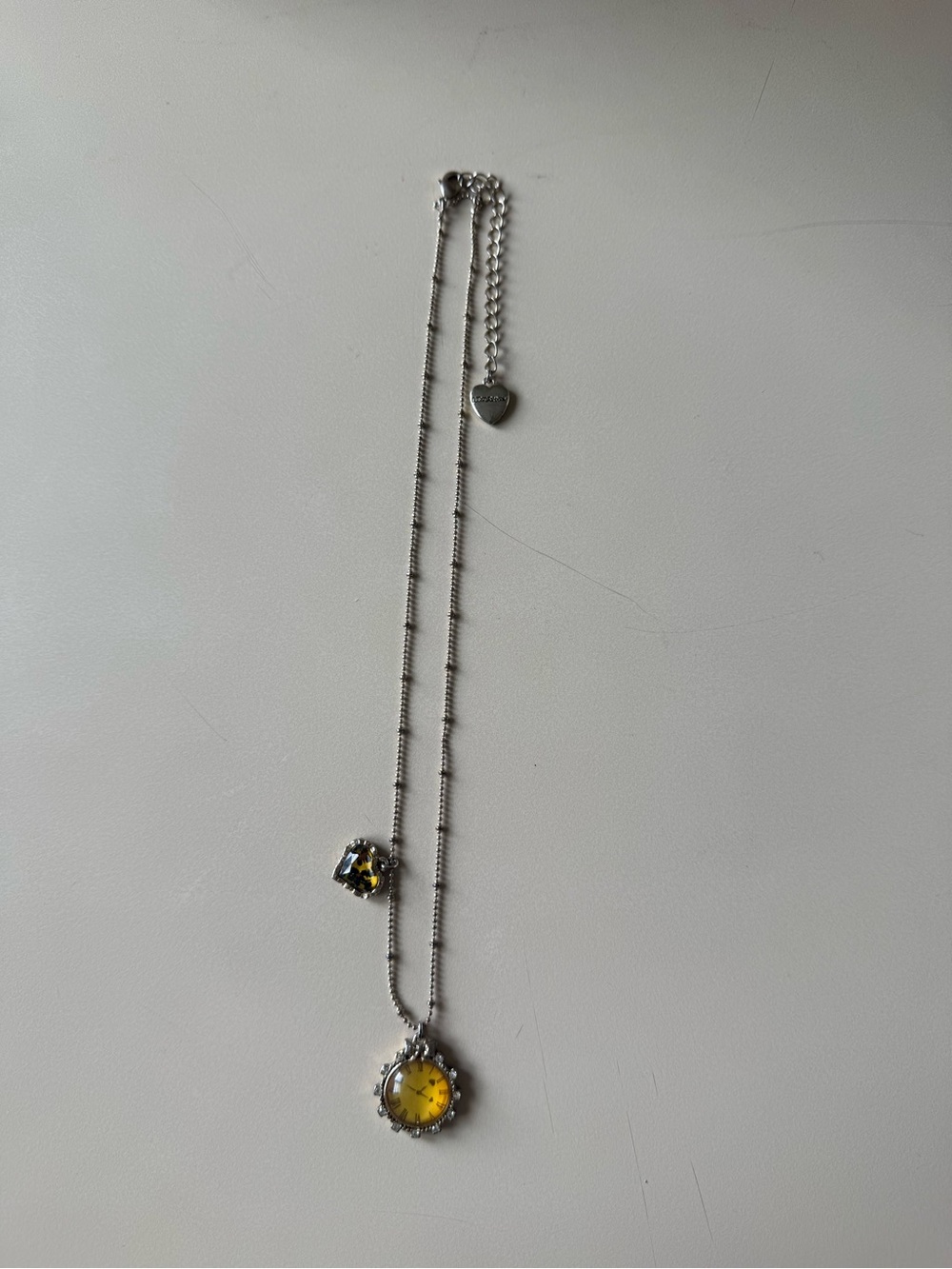 Betsey Johnson Silver Necklace with Yellow Crystal Pendant and Accent Stone